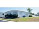 A charming home showcasing a picturesque view of the serene lake at 415 Oakwood W Blvd, Sarasota, FL 34237