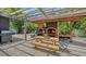 Outdoor area with picnic table, grill and pizza oven, perfect for enjoying the outdoors at 4857 Stevens Dr, Sarasota, FL 34234