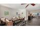 Bright dining area featuring a modern table, wicker chairs, and stylish decor at 4857 Stevens Dr, Sarasota, FL 34234