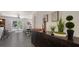 Bright dining room with dark floors, outdoor access, and an inviting table setting at 4857 Stevens Dr, Sarasota, FL 34234