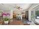 Open-concept kitchen with island seating, stainless steel appliances, and pendant lighting at 4857 Stevens Dr, Sarasota, FL 34234