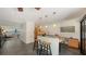 Open-concept kitchen featuring a breakfast bar and seamless flow to the living area at 4857 Stevens Dr, Sarasota, FL 34234