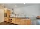 Modern kitchen with custom cabinetry, stainless steel appliances, and a sleek design at 4857 Stevens Dr, Sarasota, FL 34234