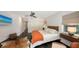 Spacious main bedroom featuring sliding closet doors and seamless flow into the hallway at 4857 Stevens Dr, Sarasota, FL 34234