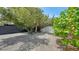 Property showcasing mature trees with ample shade, providing a tranquil outdoor environment at 4857 Stevens Dr, Sarasota, FL 34234