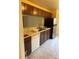 Functional kitchen featuring tile floors, white countertops, and essential appliances at 5014 Barrington Cir # 2102, Sarasota, FL 34234