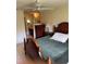Comfortable main bedroom with neutral walls, tile flooring, and a ceiling fan at 5014 Barrington Cir # 2102, Sarasota, FL 34234