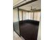 This sunroom has carpet, venetian blinds and a ceiling fan at 5014 Barrington Cir # 2102, Sarasota, FL 34234