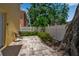 Cozy backyard patio with seating and lush landscaping, creating a peaceful retreat at 508 Howard Ct, Sarasota, FL 34236
