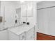 Bright bathroom featuring a marble vanity, modern fixtures, and a neutral color palette at 508 Howard Ct, Sarasota, FL 34236