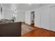 Bedroom with wood flooring, closet space, and a daybed with a throw rug at 508 Howard Ct, Sarasota, FL 34236