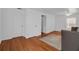 Bedroom with wood floors, closet space, and a daybed with a throw rug at 508 Howard Ct, Sarasota, FL 34236