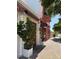 Charming outdoor cafe featuring decorative plants and inviting awnings at 508 Howard Ct, Sarasota, FL 34236