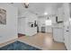 Bright kitchen featuring modern white cabinetry, stainless steel appliances, and tiled floors at 508 Howard Ct, Sarasota, FL 34236
