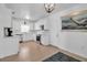 Clean white kitchen with stainless steel appliances and tiled floors at 508 Howard Ct, Sarasota, FL 34236