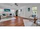 Open living room layout with hardwood floors, comfortable seating, and lots of sunlight at 508 Howard Ct, Sarasota, FL 34236