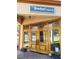 Front view of The Breakfast Company storefront with beautiful wooden doors at 508 Howard Ct, Sarasota, FL 34236