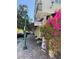 Street view with colorful flowers near a restaurant and a sidewalk at 508 Howard Ct, Sarasota, FL 34236