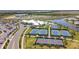 Community clubhouse features multiple recreational courts including tennis, basketball, and pickleball at 5117 Marina Basin Ct, Bradenton, FL 34211