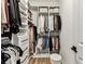 Spacious walk-in closet with built-in organizers for shoes, clothes, and accessories at 5117 Marina Basin Ct, Bradenton, FL 34211