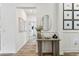Inviting hallway with table and decor that leads into the house at 5117 Marina Basin Ct, Bradenton, FL 34211