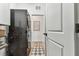 Well-organized laundry area with a modern washer and dryer, sleek cabinets, and stylish flooring at 5117 Marina Basin Ct, Bradenton, FL 34211