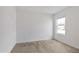 Minimalist bedroom design with a bright window at 5121 Sultana Cv, Bradenton, FL 34211