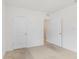 Empty bedroom features new carpet with white walls at 5121 Sultana Cv, Bradenton, FL 34211