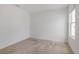 Neutral carpeted bedroom with white trim and neutral walls at 5121 Sultana Cv, Bradenton, FL 34211