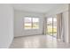 Vacant bedroom with sliding door access to the exterior at 5121 Sultana Cv, Bradenton, FL 34211