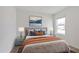 Comfortable bedroom with a well-decorated bed and bedside tables at 5121 Sultana Cv, Bradenton, FL 34211