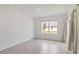 Bright, vacant bedroom with tile flooring at 5121 Sultana Cv, Bradenton, FL 34211