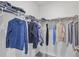 Walk-in closet features wire shelving for optimal storage and organization of clothing and accessories at 5121 Sultana Cv, Bradenton, FL 34211