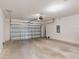 Spacious two-car garage featuring an automatic door opener and ample room for parking and storage at 5121 Sultana Cv, Bradenton, FL 34211
