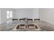 The kitchen island features a stainless steel sink, faucet, and granite countertops at 5121 Sultana Cv, Bradenton, FL 34211
