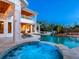 Inviting backyard oasis with a pool, spa, and covered patio, ideal for relaxation and outdoor gatherings at 5132 Jungle Plum Rd, Sarasota, FL 34242