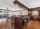 Entertainment area with wet bar, seating, and access to the outdoor living space at 5132 Jungle Plum Rd, Sarasota, FL 34242