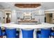 Gourmet kitchen featuring custom cabinetry, a large island, and professional-grade appliances at 5132 Jungle Plum Rd, Sarasota, FL 34242