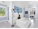 Elegant main bathroom with a soaking tub, walk-in shower, and custom vanity at 5132 Jungle Plum Rd, Sarasota, FL 34242