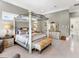 Spacious main bedroom with stylish furnishings and ample natural light at 5132 Jungle Plum Rd, Sarasota, FL 34242