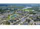 Aerial view of the property showcasing its location within a well-maintained community and scenic surroundings at 5320 Tide Point Way, Bradenton, FL 34208