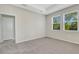 Bedroom with a view to the exterior through the windows at 5985 Amberly Dr, Bradenton, FL 34208