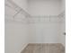 Walk-in closet space with shelving for optimal organization at 5985 Amberly Dr, Bradenton, FL 34208