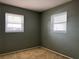 Spacious bedroom with two windows providing plenty of natural light at 6074 Arlene Way # 5, Bradenton, FL 34207