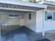 The carport provides covered parking and protection from the elements at 6074 Arlene Way # 5, Bradenton, FL 34207