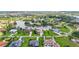 Stunning aerial view of a beautiful residential community surrounding a tranquil lake at 6143 9Th Avenue Ne Cir, Bradenton, FL 34212