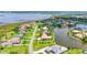 Scenic aerial view of waterfront homes with private docks and Gulf access at 6143 9Th Avenue Ne Cir, Bradenton, FL 34212