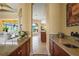 Detailed view of the bar area leading to a bright and airy living space with water views at 6143 9Th Avenue Ne Cir, Bradenton, FL 34212