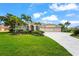 Inviting single-Gathering home with lush landscaping and a spacious three-car garage, perfect for luxury living at 6143 9Th Avenue Ne Cir, Bradenton, FL 34212