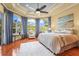 Primary bedroom featuring coffered ceilings and a large window at 6143 9Th Avenue Ne Cir, Bradenton, FL 34212